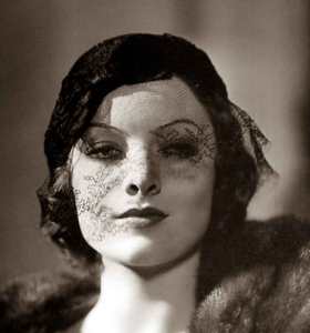 Image of Myrna Loy hat veil 1930s for haiku prompt words veiled and fray trail blazing hollywood actress